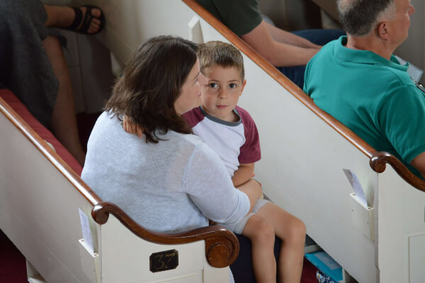 Mother and son at worship – UUAC