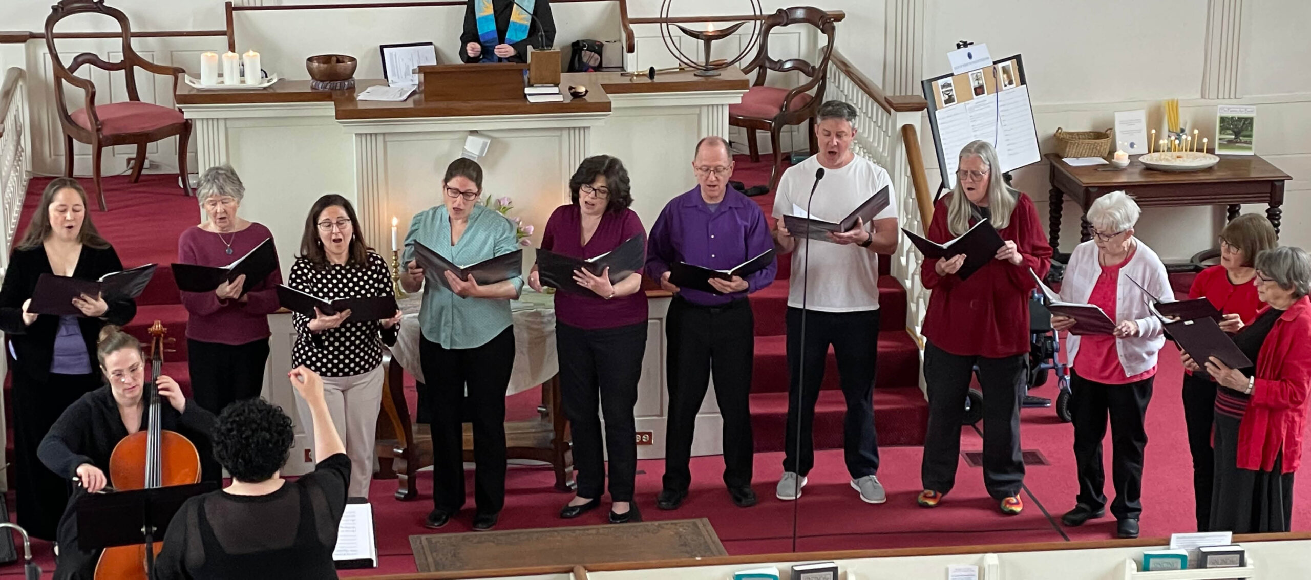 Choir singing at front of sanctuary