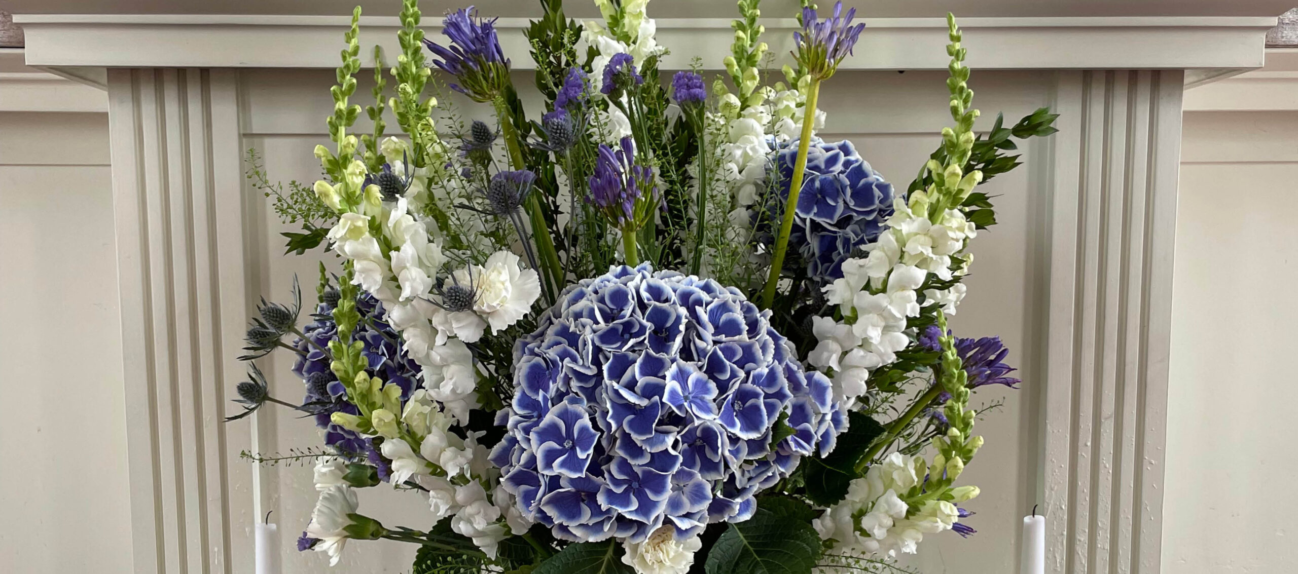 Flowers at the front of the sanctuary